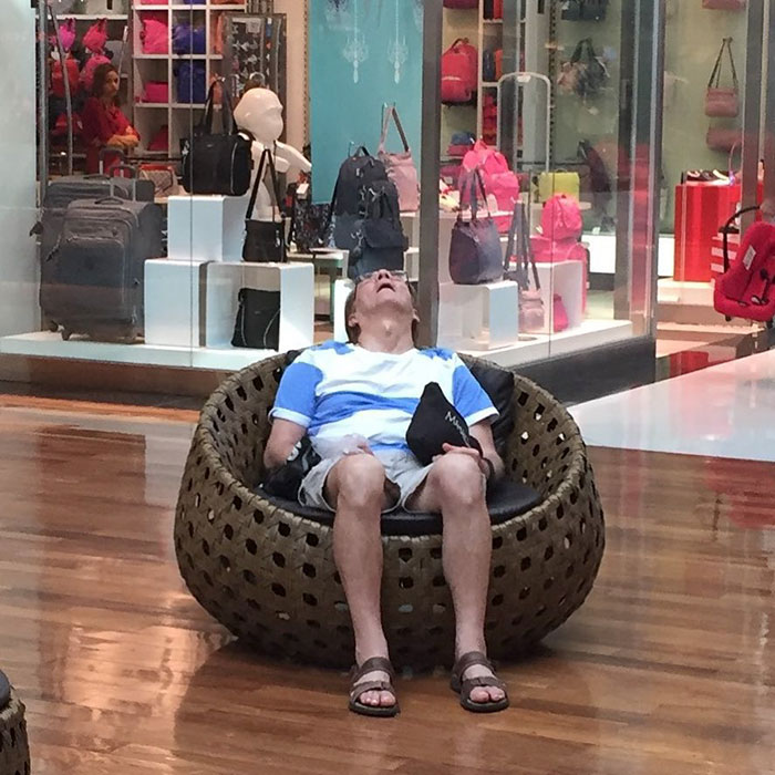 50 Hilarious Pictures Of Miserable Men Waiting While Their Wives Were 