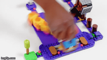 LEGO Super Mario attacking Wiggler Poison Swamp gif