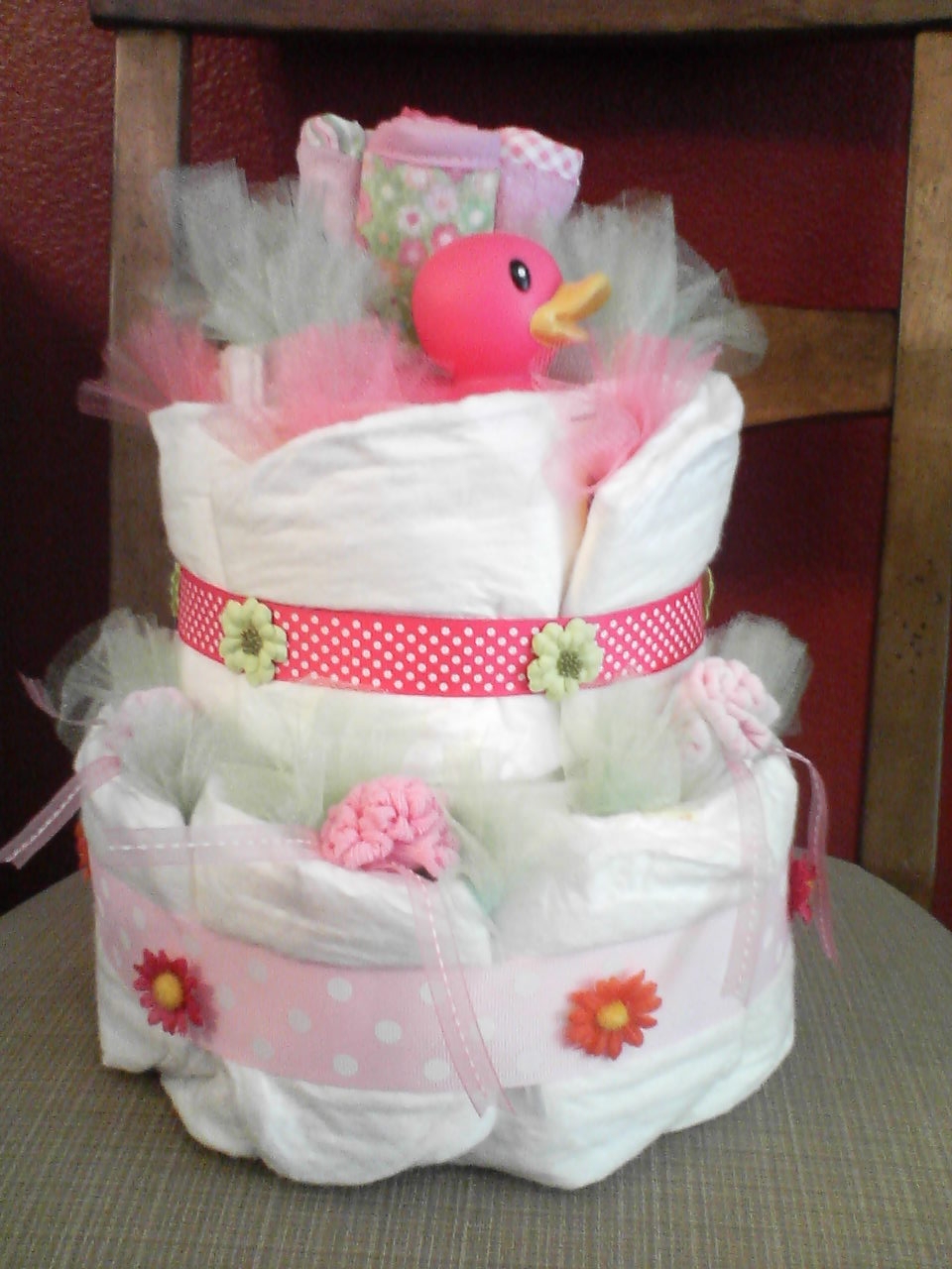 Recyclees Crafts Diaper cakes using recycled ribbons and cloths