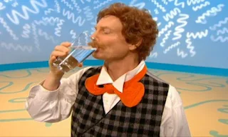 Mr. Noodle begins to drink water from a glass. That's not winking. That's drinking. Elmo's World Eyes The Noodle Family