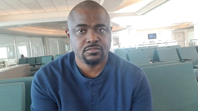 Guy at Airport with look of Disappointment about fly standby