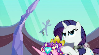 Rainbow slides down the roof as Rarity wonders what's going on