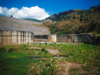Natural View Output Side Of The Dam Construction Building With River Water Flow In The Valley Of Hills North Bali Indonesia