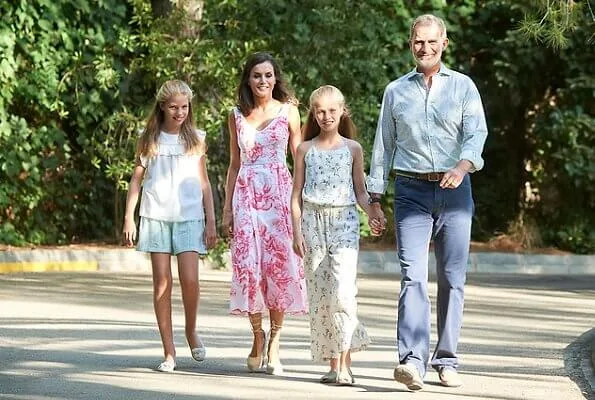 Princess Leonor wore Mango floral print top and trousers, Queen Letizia wore a pink floral print v-neck summer dress