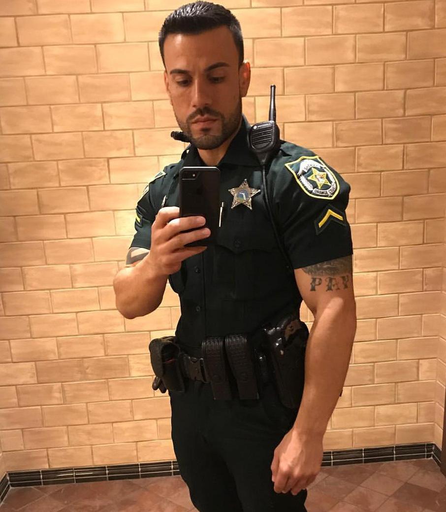 handsome-uniformed-male-policeman-daddy-selfie
