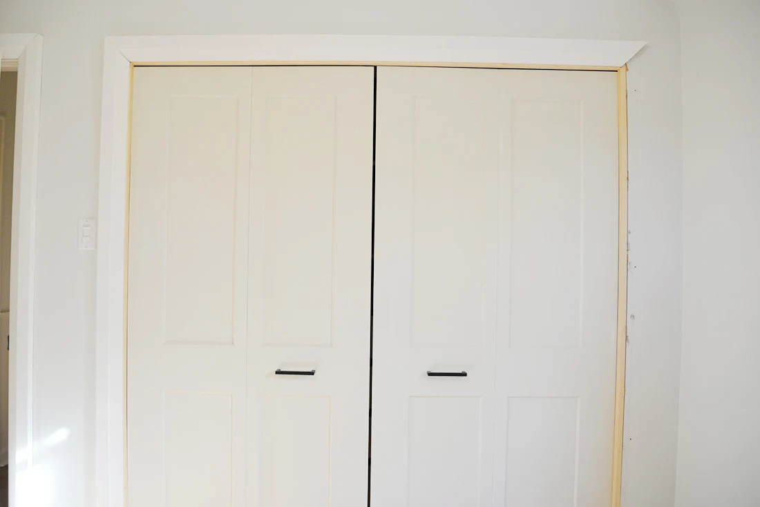 bifold door knob placement, how to install a bifold closet door, bifold closet door installation, bifold knob placement