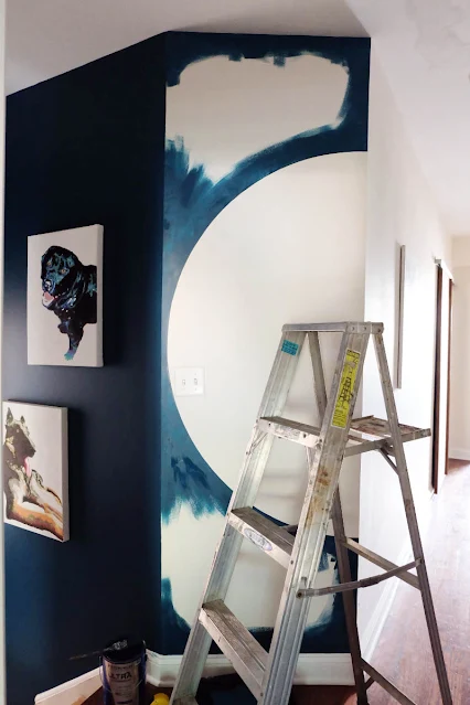 painting half circle on wall in progress