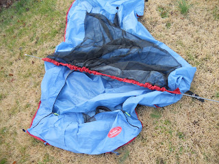 Assemble the front arch pole (A) and insert through tent sleeve