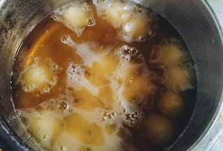 Cooking Kala Jamun balls in oil Kala Jamun Recipe