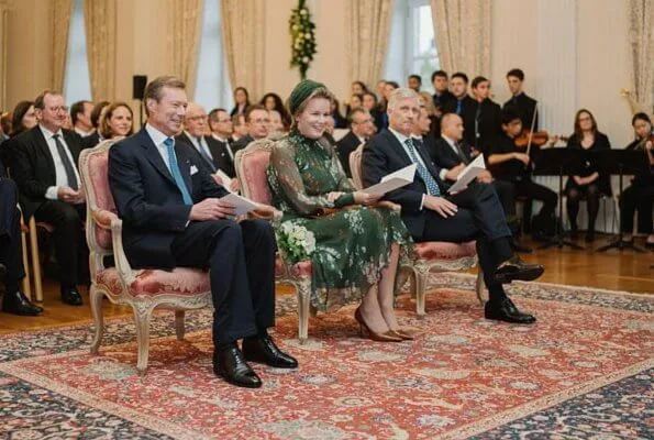 Queen Mathilde wore a floral print dress by Natan. Grand Duchess Maria Teresa. Princess Stephanie