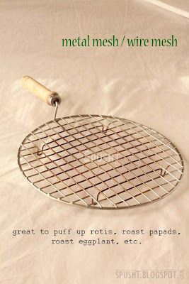 metal mesh or wire mesh with handle to roast papad and puff up roti