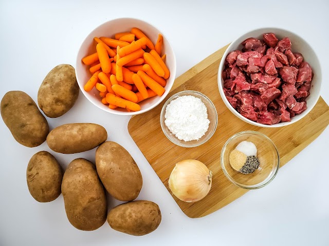 Easy Slow Cooker Beef Stew recipe ingredients displayed on a white background.