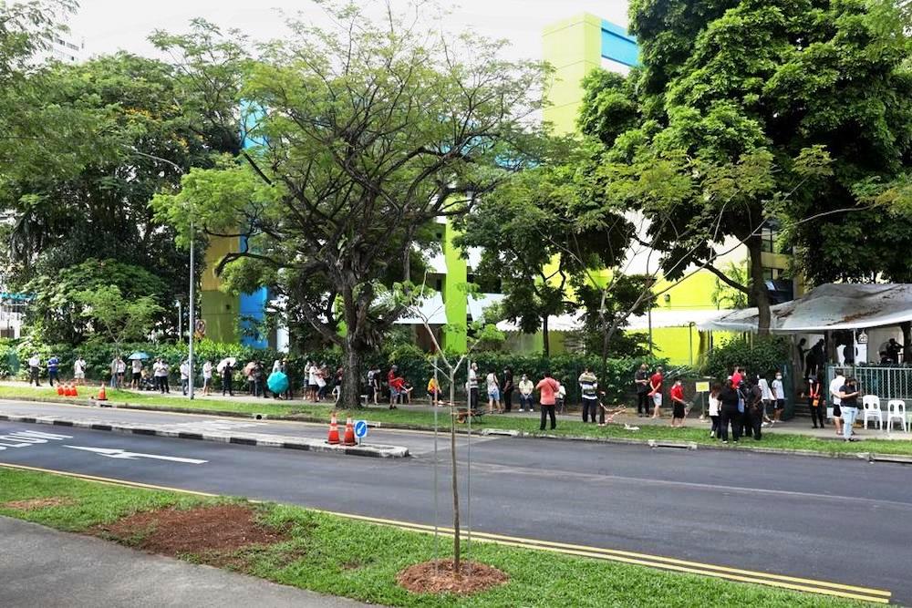 Queues seen outside the former Da Qiao Primary School at Ang Mo Kio, one of the regional screening centres for Covid-19 swab testing, on May 3, 2021