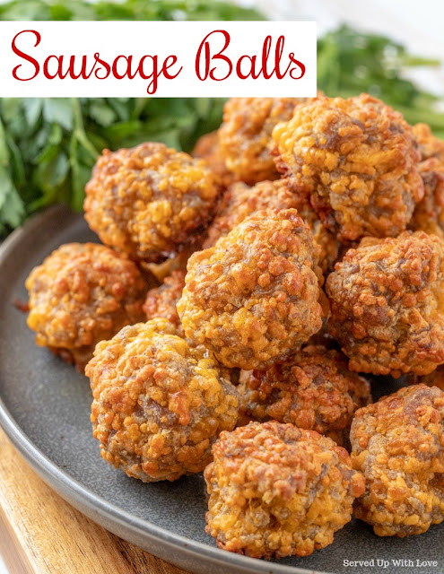 Plate of cooked cheesy sausage balls