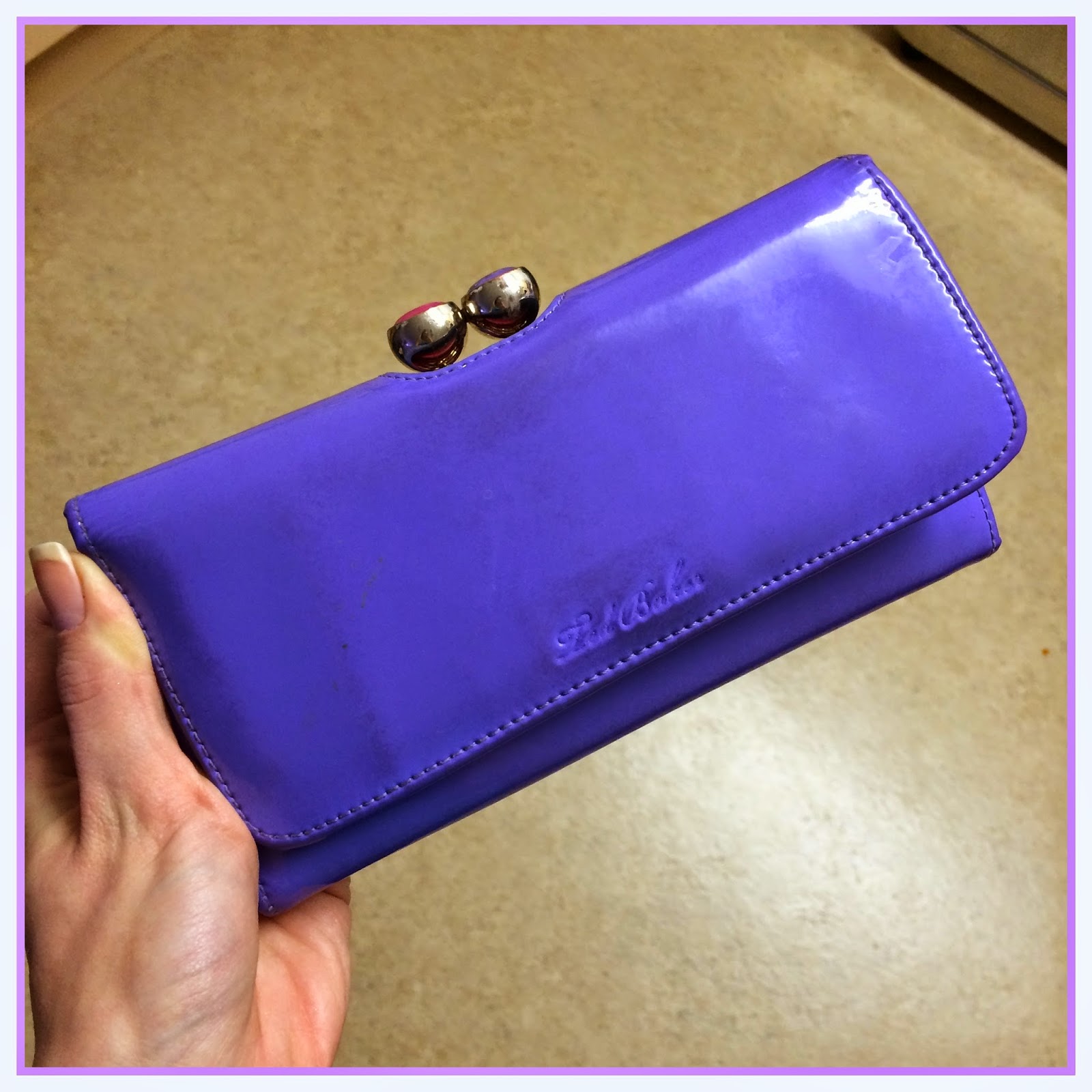 stolen-purple-ted-baker-purse