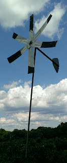 black and white windmill in the sky