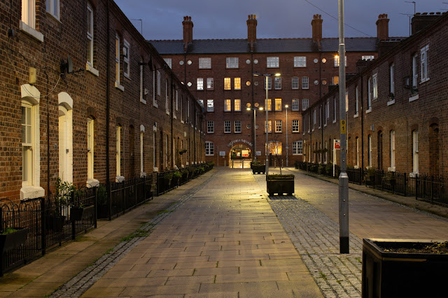 Street with row of terraced houses on each side at night time