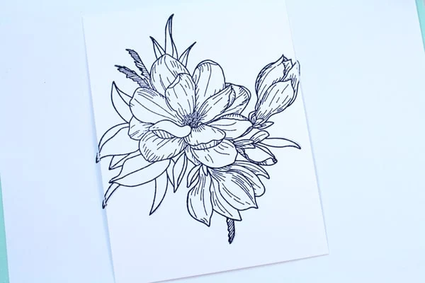 Make a handmade card with floral stamps.
