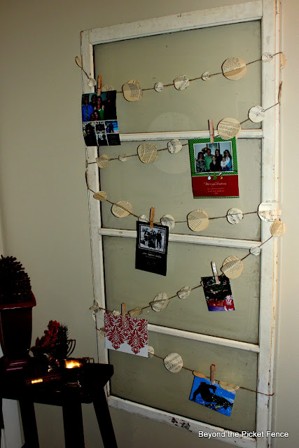 Christmas card holder repurposed window http://bec4-beyondthepicketfence.blogspot.com/2012/11/12-days-of-christmas-day-3.html
