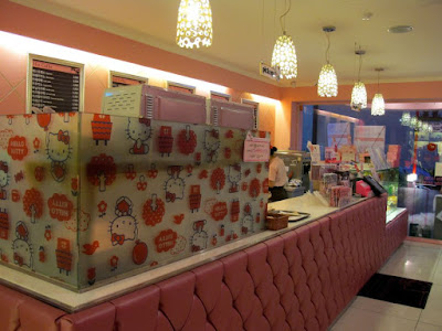 The cashier and cake display at Hello Kitty Cafe Hongdae