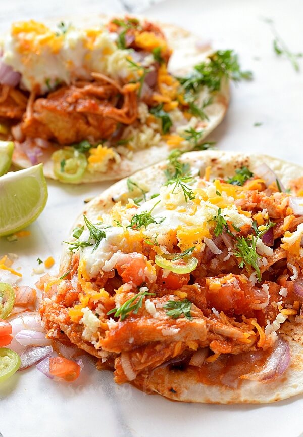 authentic mexican tacos with chopped onion,tomato