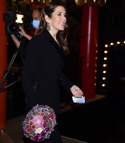 Crown Princess Mary wore a new tuxedo jumpsuit from Max Mara, and Hangisi jeweled pumps from Manolo Blahnik. Max Mara Dover tuxedo jumpsuit