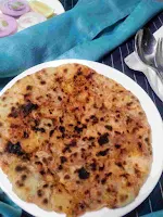 Serving crisp golden amritsari kulcha