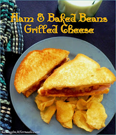 Ham and Baked Beans Grilled Cheese is a hearty sandwich. Ham and cheese meets grilled cheese with baked beans for added flavor. | Recipe developed by www.BakingInATornado.com | #recipe #sandwich