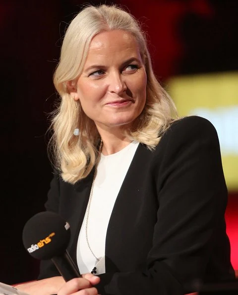 Crown Princess Mette-Marit wore a white polka dot belted skirt and black short jacket. The Homeland and other stories