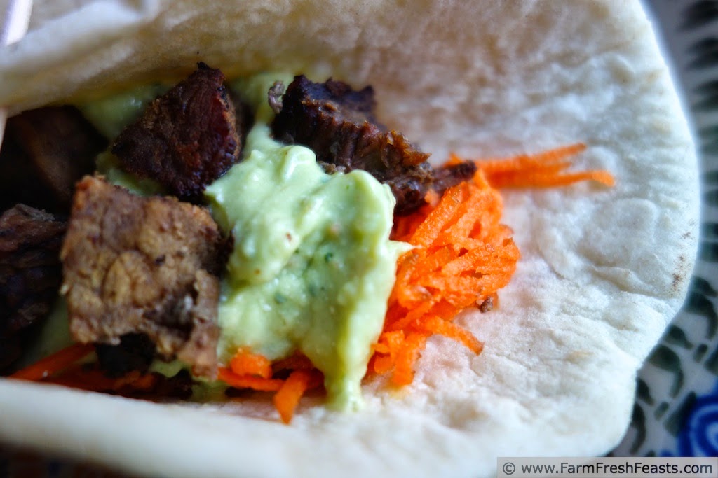 Beef cubes, marinated in artichoke, lemon, and olive juices served taco style with avocado dip.