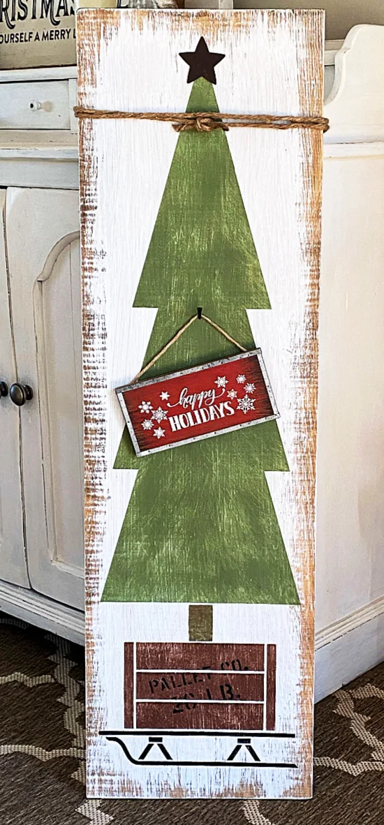 Christmas tree with a sign