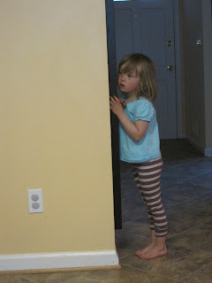 Four-year-old girl in stripey leggings