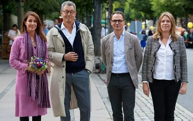 Princess Marie wore a new pink coat from Stine Goya, and ankle boots by UFO. She wore a necklace by Christine Hvelplund