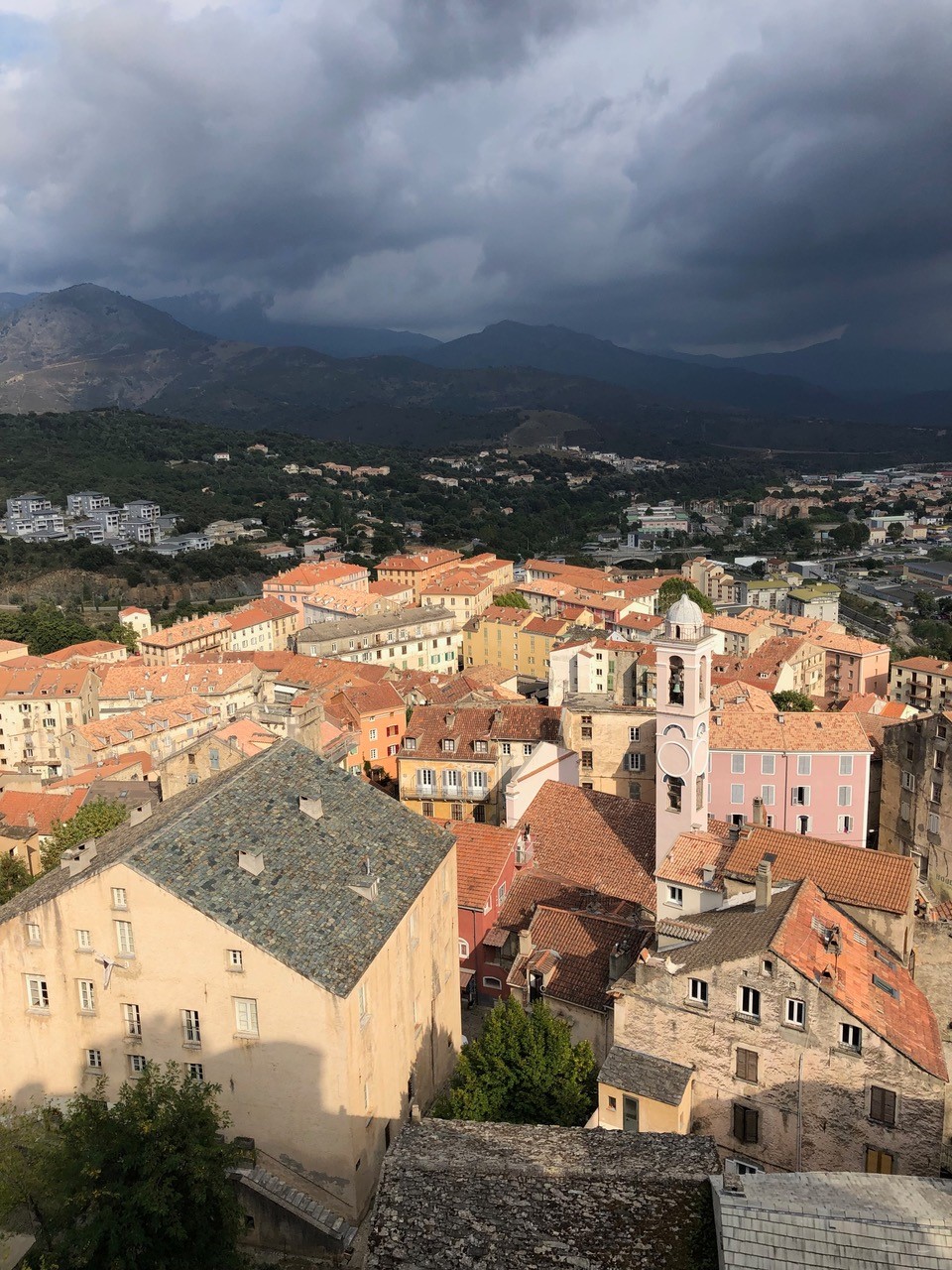 rooftops and mountains in corsica, france