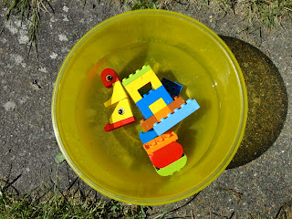 Lego Duplo in a bowl of water
