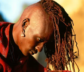 At the climax of the Manyatta ceremony, each Maasai Warrior initiate has his hair shaved by his mother.