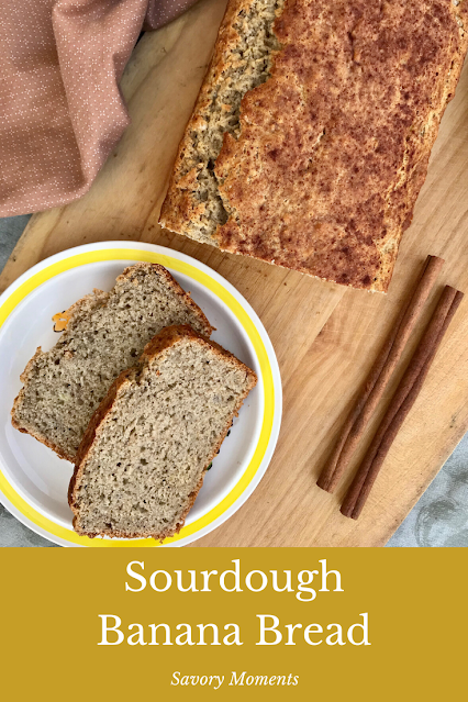 Serving plate of sourdough banana bread on a cutting board.