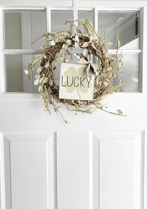 front door with hanging wreath