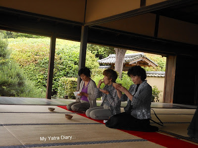 A group of  people taking tea at the Jikoin Zen Temple, Nara - Japan