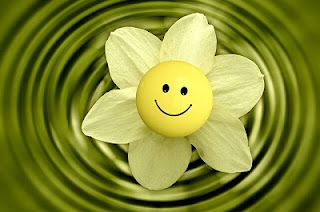 emoticon sorrindo e flor