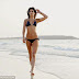 TOWIE's Jasmin Walia puts her enviable figure on display in navy two-piece as she enjoys relaxing break in Dubai