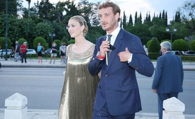 Beatrice Borromeo wore a golden fringed gown and headpiece from Christian Dior. Buccellati Milan earrings and bracelet