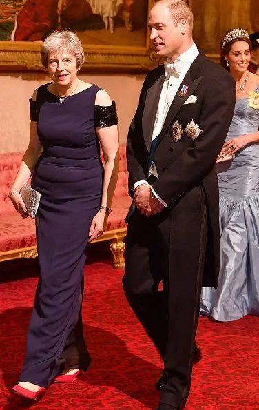 Kate Middleton's wearing the Lovers Knot Tiara, Diana's Collingwood earrings and blue McQueen gown. Maxima' Jan Taminiau gown and pearl tiara