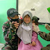 Babinsa Dan Bhabinkamtibmas Hibur Anak Saat BIAS