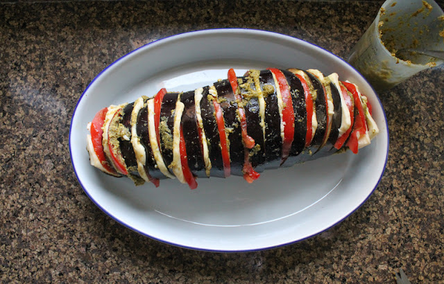 Food Lust People Love: Caprese Stuffed Roasted Eggplant is a showstopper of a main course, guaranteed to be loved by vegetarians and omnivores alike. After all, who can resist ripe tomatoes, flavorful basil pesto and melty mozzarella roasted in a hasselback-cut eggplant?
