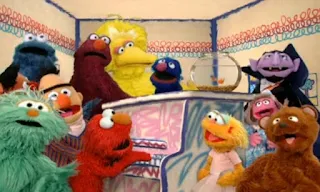 Elmo, Rosita, Grover, Cookie Monster, Telly, Zoe, The Count, Baby Bear, Big Bird, Prairie Dawn, Ernie and Bert sing the Friends Song together. Sesame Street Elmo's World Friends Song
