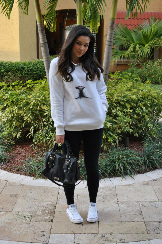 Sheinside White Kitty Cat Face Sweater, Black Old Navy leggings, Steve Madden bag, 247jewelry chain necklace, Converse White Chuck Taylor Sneakers, white chuck outfits