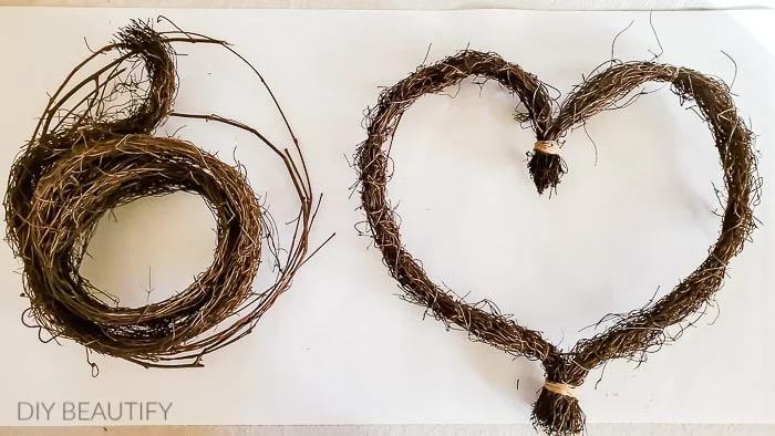 turn grapevine garland into a heart shaped wreath