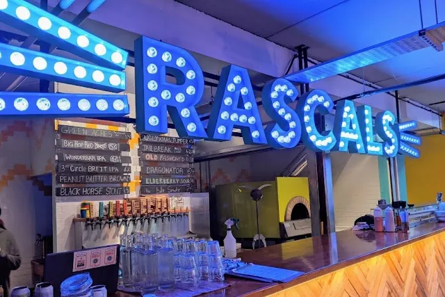 Neon sign over the bar at Rascal's HQ Brewery in Inchicore