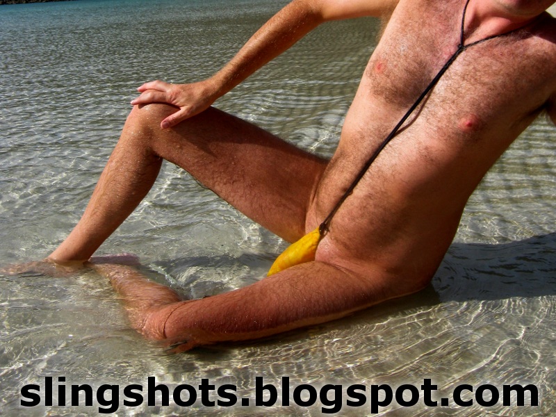 Slingshot swimwear: Reclining sling swimsuit.